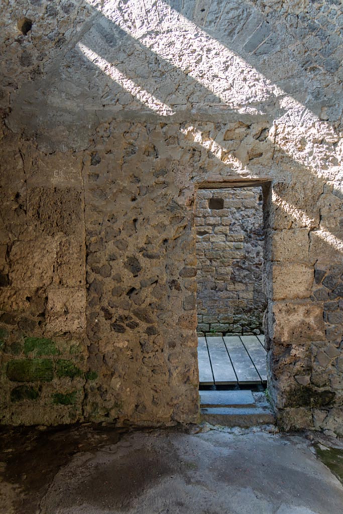 Villa of Mysteries, Pompeii. October 2023. 
Room 48-9, doorway in west wall leading into corridor 27. Photo courtesy of Johannes Eber.