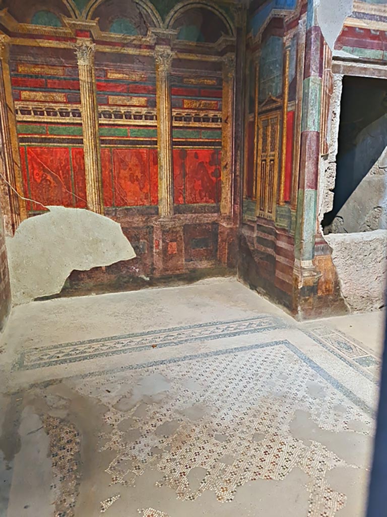Villa of Mysteries, Pompeii. November 2023. 
Room 16, looking across mosaic flooring towards east wall and bed recess. Photo courtesy of Giuseppe Ciaramella.