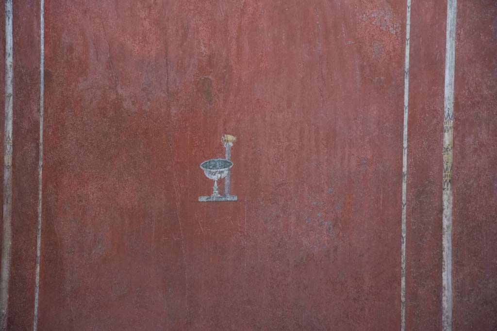 Villa of Mysteries, Pompeii. March 2019. Room 14, detail of painted decoration in centre of panel on south wall of cubiculum. 
Foto Annette Haug, ERC Grant 681269 DÉCOR.