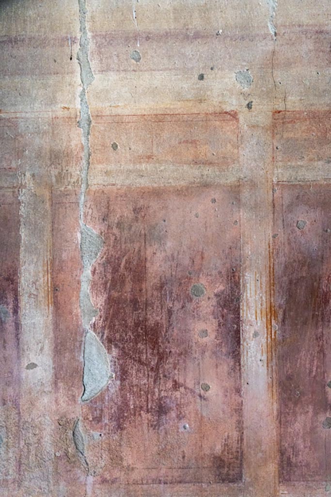 Villa of Mysteries, Pompeii. October 2023. 
Room 19, detail of painted decoration on south wall. Photo courtesy of Johannes Eber.
