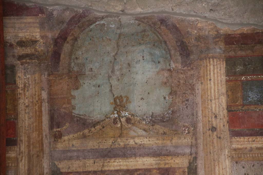 Villa of Mysteries, Pompeii. April 2014. Room 6, detail from north wall above painted doorway in centre. 
Photo courtesy of Klaus Heese.
