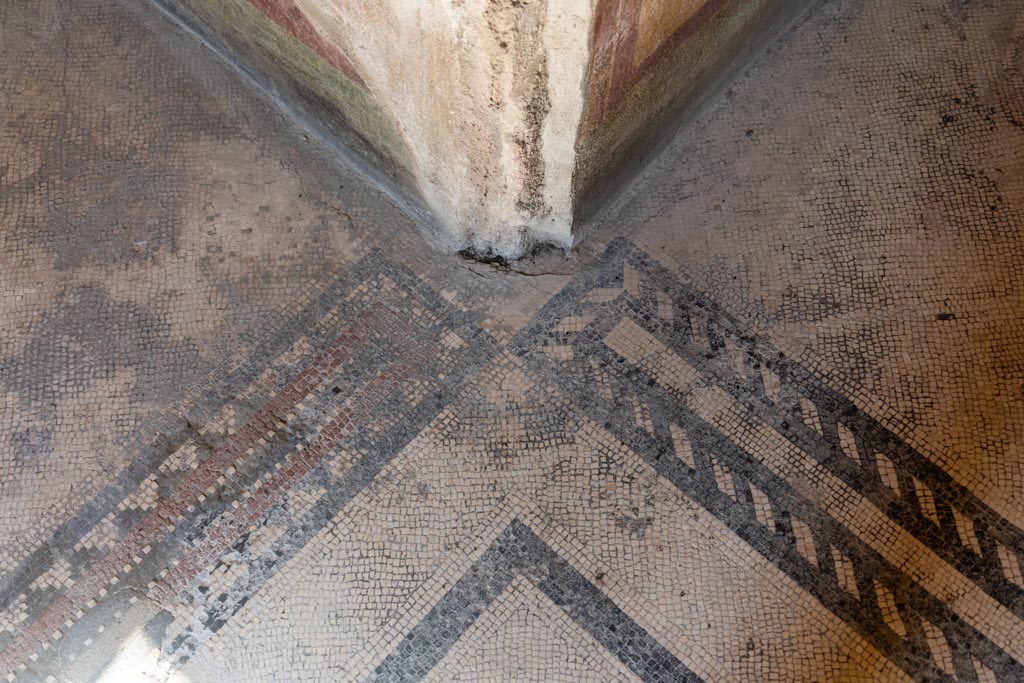 Villa of Mysteries, Pompeii. October 2023. 
Room 8, detail of flooring at join of two alcoves, looking north-west. Photo courtesy of Johannes Eber.