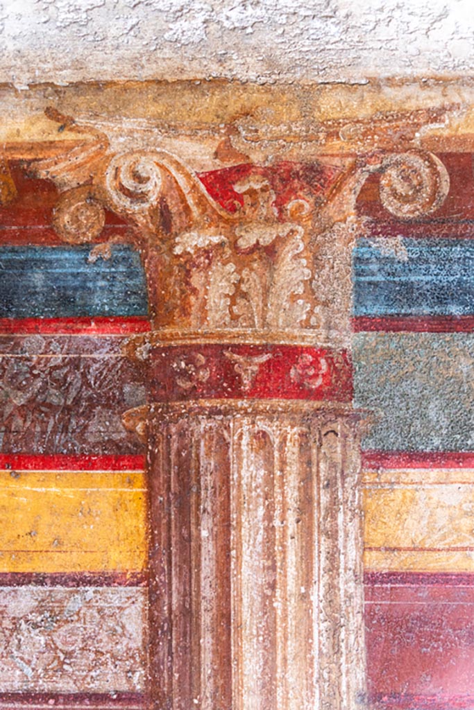 Villa of Mysteries, Pompeii. October 2023. 
Room 8, detail of painted column on upper east wall. Photo courtesy of Johannes Eber.