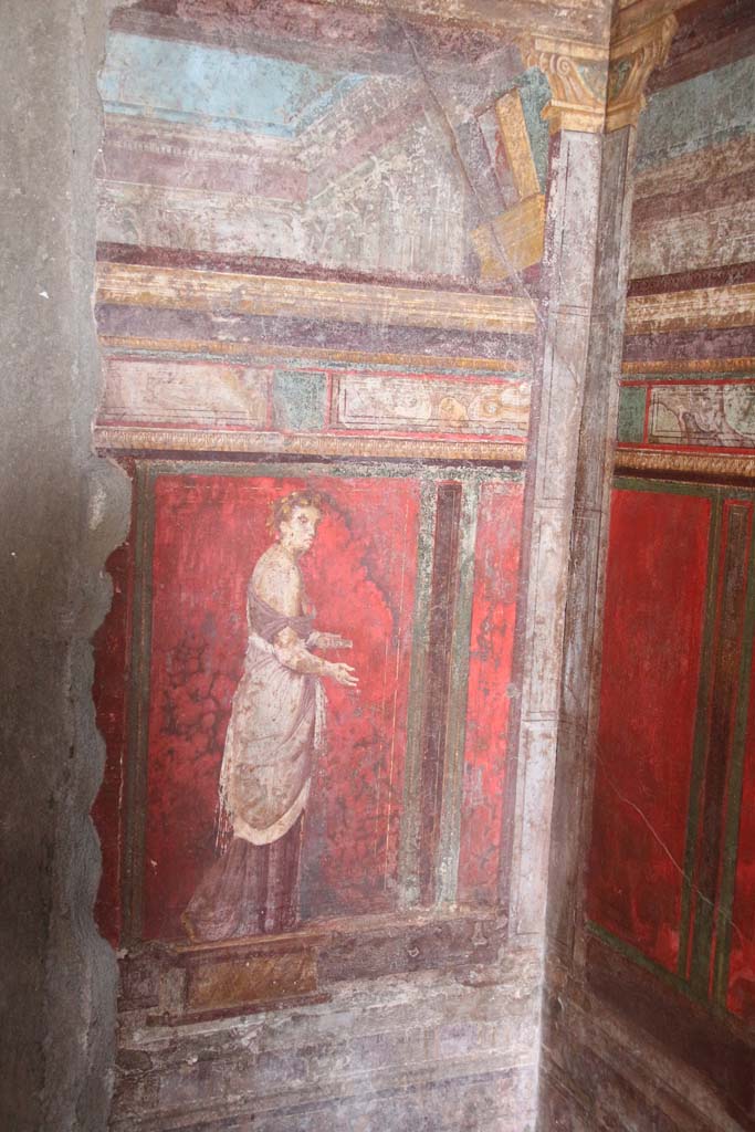 Villa of Mysteries, Pompeii. April 2014.  
Room 4, detail of wall painting of a priestess, on east wall.
Photo courtesy of Klaus Heese.