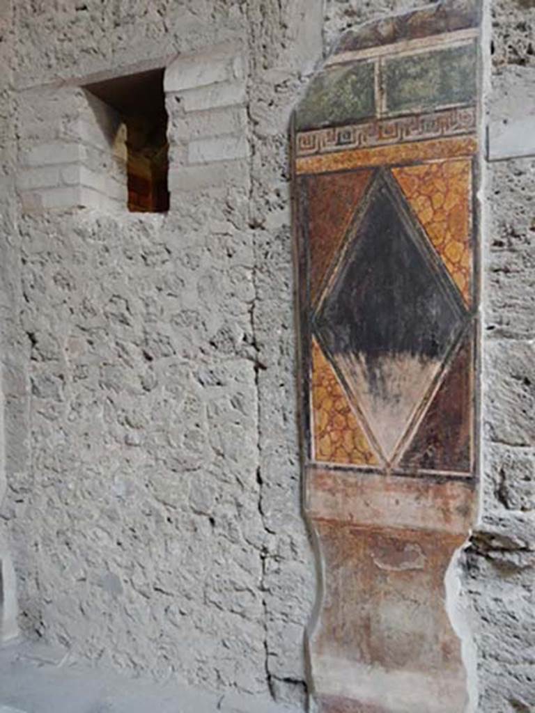 Villa of Mysteries, Pompeii. May 2015. Room 64, detail from north wall near north-west corner.  Photo courtesy of Buzz Ferebee.