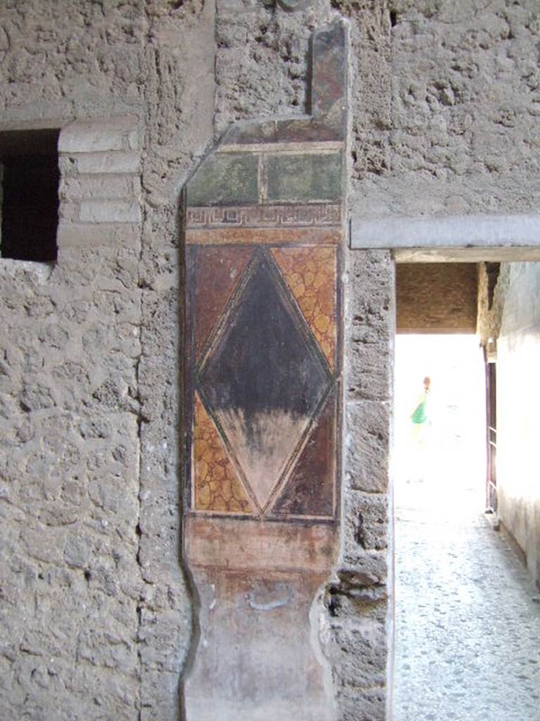 Villa of Mysteries, Pompeii. May 2006. Room 64, wall decoration on north wall next to corridor F2.