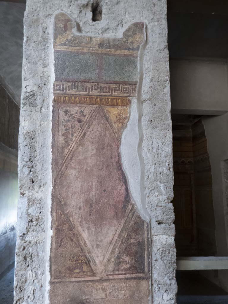 Villa of Mysteries, Pompeii. September 2017. 
Room 64, painted decoration on south wall between doorways to corridor F1, and room 3.
Foto Annette Haug, ERC Grant 681269 DÉCOR.