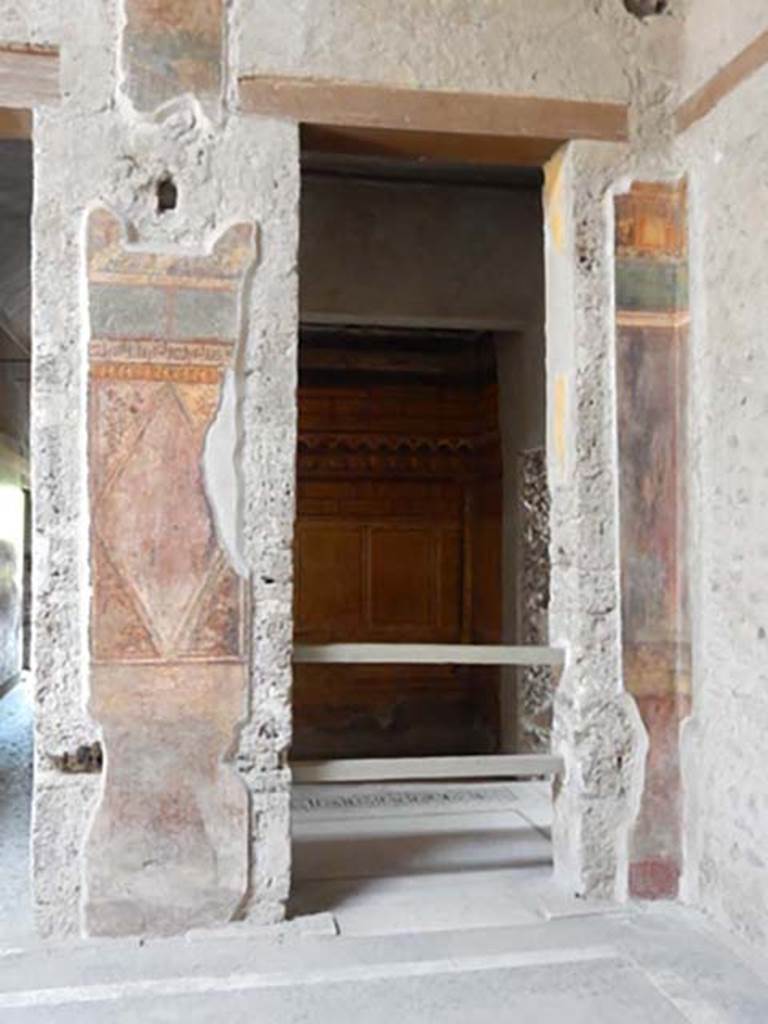 Villa of Mysteries, Pompeii. May 2015. Room 64, south-west corner of atrium.
Looking south through doorway into room 3. Photo courtesy of Buzz Ferebee.