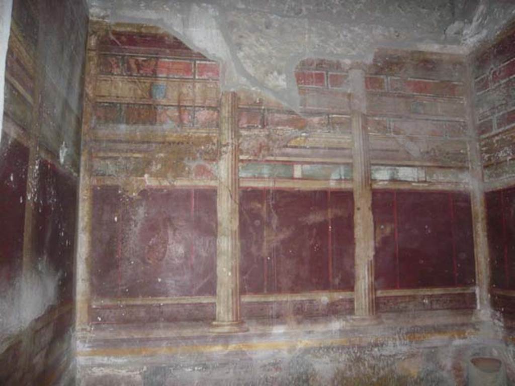 Villa of Mysteries, Pompeii. May 2012. Room 15, west wall with detail of second style painting. Photo courtesy of Buzz Ferebee.