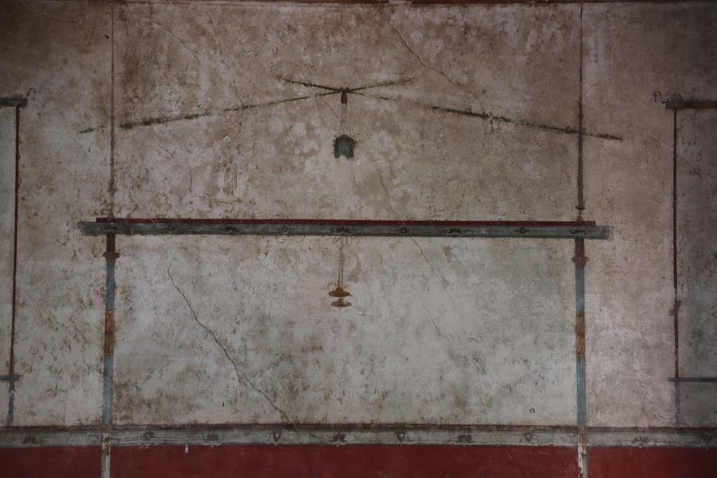 Villa of Mysteries, Pompeii. September 2021. Room 11, painted decoration from upper south wall, in centre. Photo courtesy of Klaus Heese.