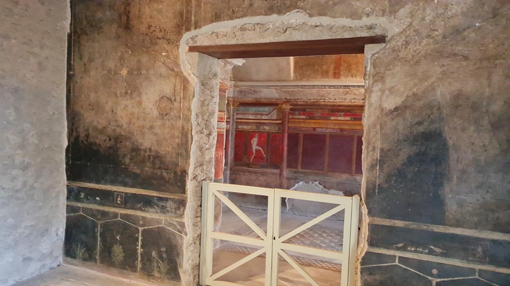 Villa of Mysteries, Pompeii. November 2023.
Room 2, tablinum, south wall with doorway into room 4. Photo courtesy of Giuseppe Ciaramella.