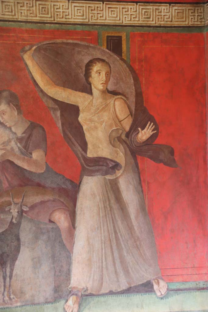 Villa of Mysteries, Pompeii. September 2021. 
Room 5, a maenad, who animated the processions of Dionysus, recoils in fear, figure from east end of north wall. 
Photo courtesy of Klaus Heese.