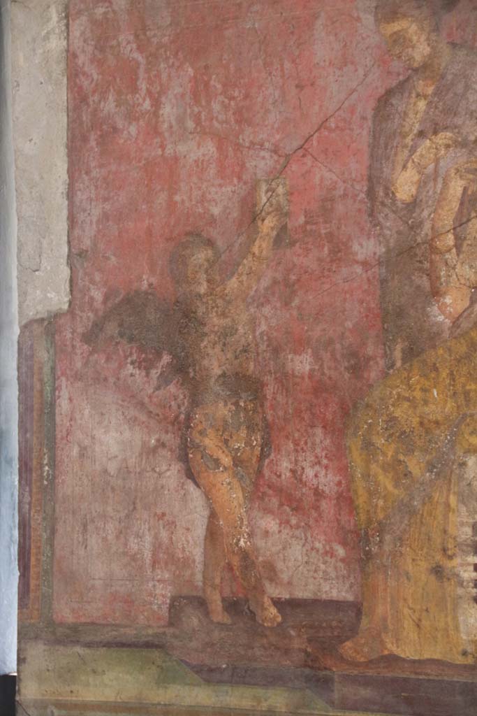 Villa of Mysteries, Pompeii. April 2014. Room 5, detail of Eros from south wall. 
Photo courtesy of Klaus Heese.