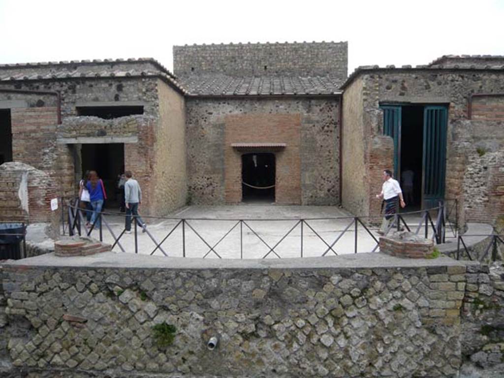 Villa of Mysteries, Pompeii. May 2012. 
Looking east across remains of exedra towards room 1, and doorway into tablinum,2. 
On the right is the doorway into the portico P2, rooms 4 and 5. Photo courtesy of Buzz Ferebee.