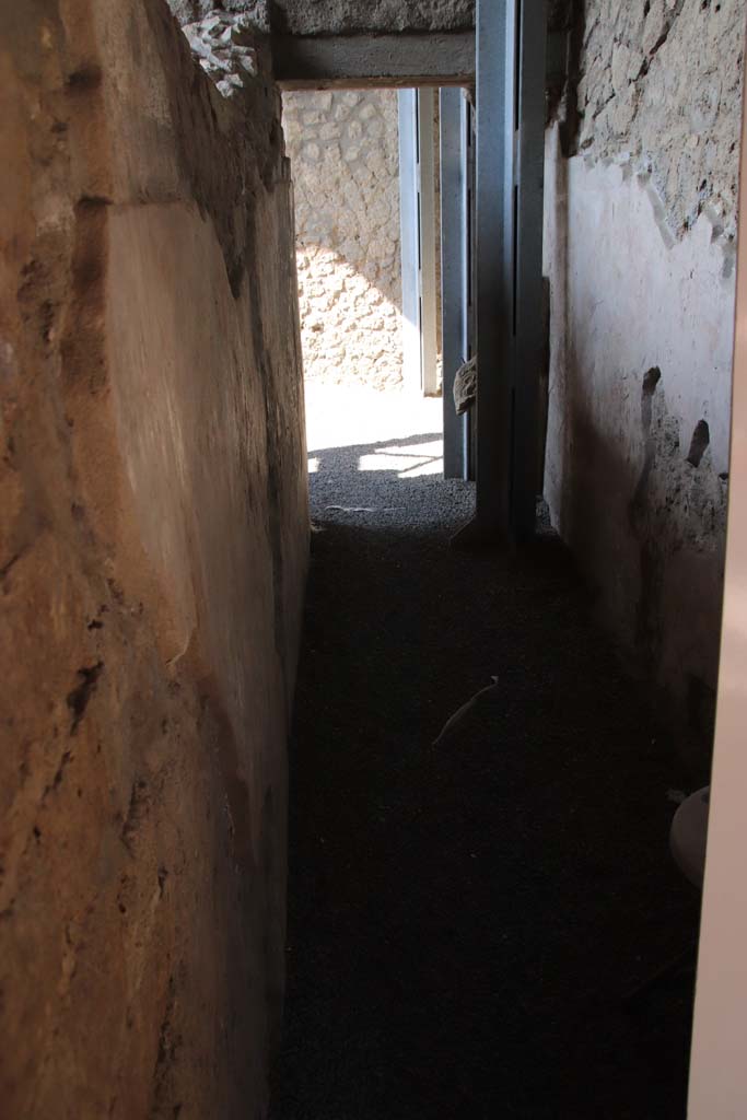 Villa Regina, Boscoreale. September 2021. 
Looking south along corridor XI towards cubiculum XVI. Photo courtesy of Klaus Heese.