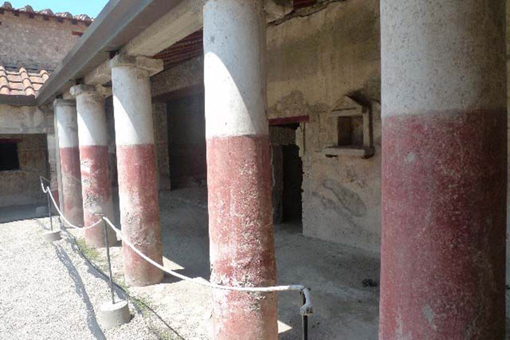 Villa Regina, Boscoreale. July 2010. Room I, looking south along west side of portico VII.
Photo courtesy of Michael Binns.