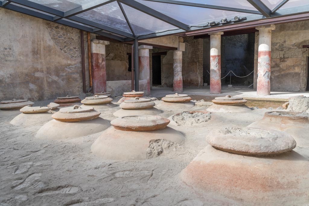 Villa Regina, Boscoreale. October 2021. 
Room I, cella vinaria, looking across courtyard towards south portico and south-west corner. Photo courtesy of Johannes Eber.