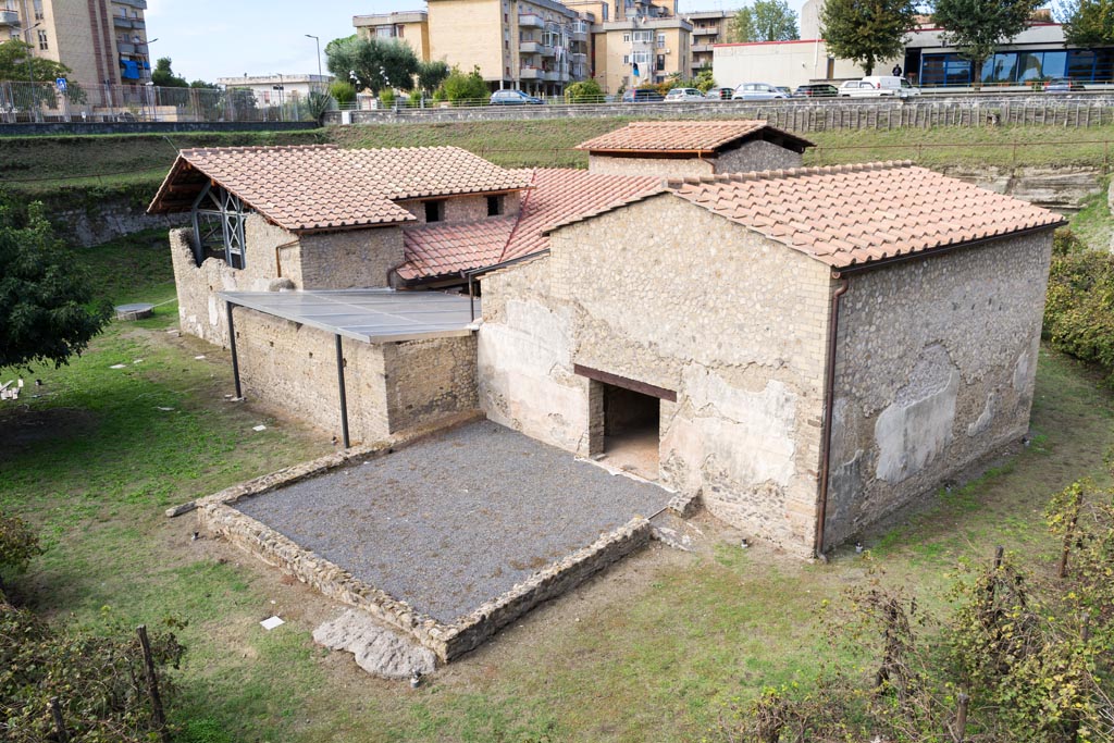 Villa Regina, Boscoreale. October 2021. 
Looking south along east side towards threshing terrace XVII, and doorway into room VIII, the barn. Photo courtesy of Johannes Eber.