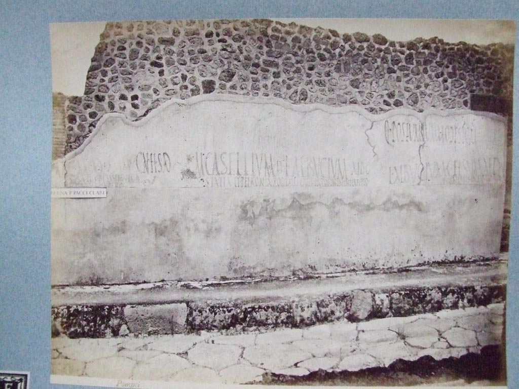 Unnamed vicolo between IX.2 and IX.3. North side. Graffiti on wall between IX.3.18 and IX.3.19.
Old undated photograph courtesy of the Society of Antiquaries, Fox Collection.