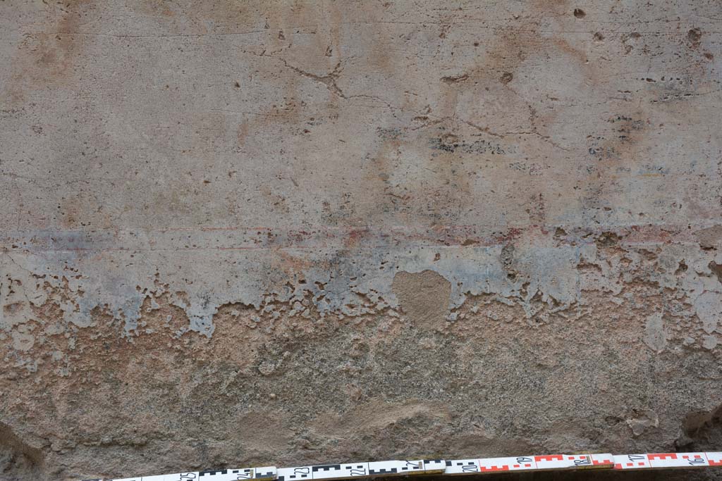 Unnamed vicolo between IX.5 and IX.6. May 2017. Detail of painted decoration on north side of roadway at IX.5.18/19.
Foto Christian Beck, ERC Grant 681269 DÉCOR.