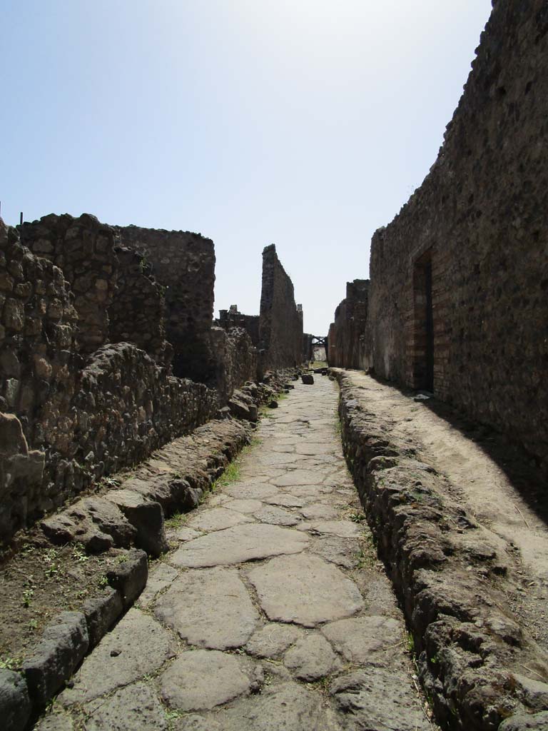 Unnamed vicolo between IX.6 and IX.5. Pompeii. April 2019. 
Looking west from junction with Vicolo del Centenario. Photo courtesy of Rick Bauer.