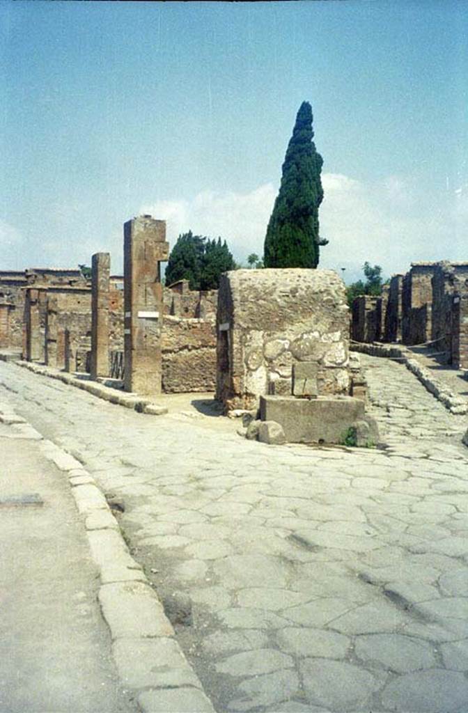 Via Consolare between VI.17 and VI.1. July 2011. Looking north towards junction with Vicolo di Narciso. Photo courtesy of Rick Bauer.