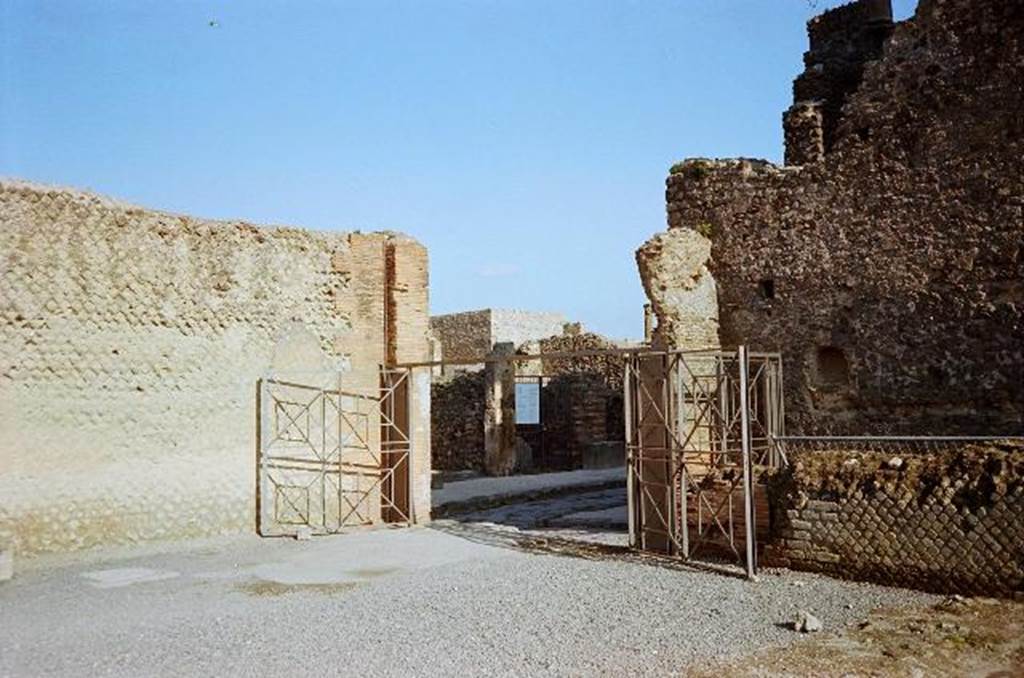 Via Marina, looking north through gates of Temple of Venus towards VII.7.  The alleyway between the Basilica and Temple of Venus is on the right of the picture.   Photo courtesy of Rick Bauer.   January 2010.