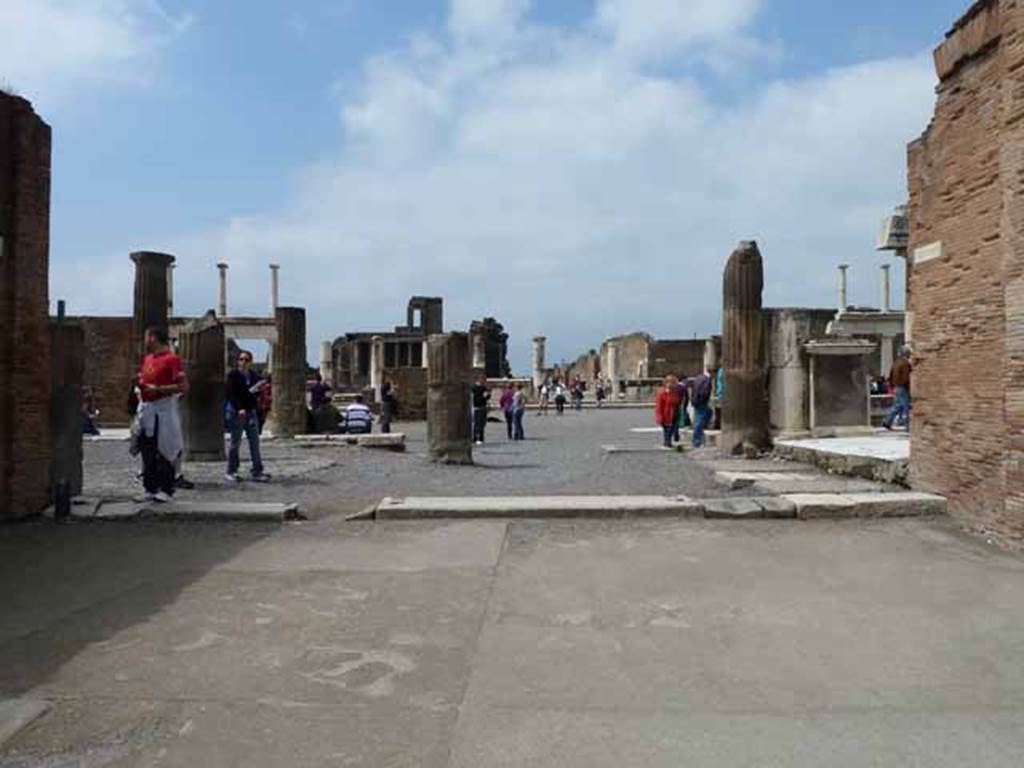Looking west straight across the Forum towards the east end of the Via Marina, from Via dell’Abbondanza. May 2010.