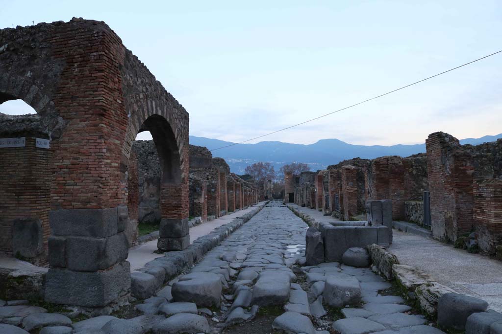 Via Stabiana, at IX.2.1, Pompeii, on left. December 2018. 
Looking south between IX.2, on left, and VII.1, on right. Photo courtesy of Aude Durand.