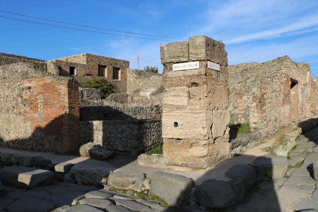 Via Stabiana, east side, Pompeii. December 2018. 
Looking north-east at junction with Vicolo, on right, towards IX.3.10, on left. Photo courtesy of Aude Durand.