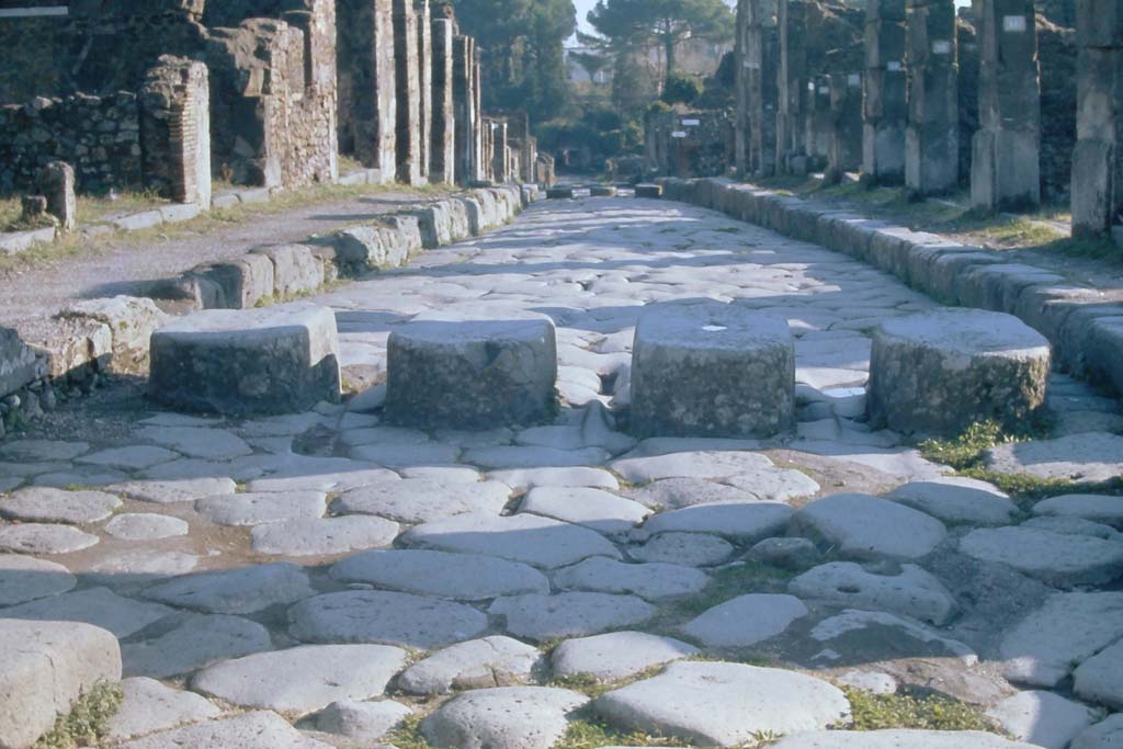 Via Stabiana, 4th December 1971. Looking south between I.4 and VIII.4, with detail of lava roadway and stepping stones. 
Photo courtesy of Rick Bauer, from Dr. George Fay’s slides collection.