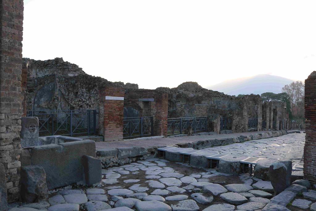 Via Stabiana, east side, Pompeii. December 2018. Looking south-east towards Insula 4 of Region I, (I.4.15 at rear of fountain).
 Photo courtesy of Aude Durand.