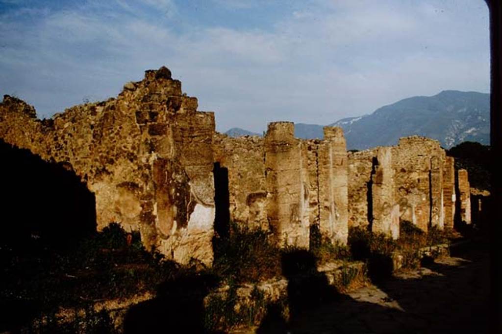 I.4.11 on left, looking south along east side of Via Stabiana, Pompeii. 1964.  Photo by Stanley A. Jashemski.
Source: The Wilhelmina and Stanley A. Jashemski archive in the University of Maryland Library, Special Collections (See collection page) and made available under the Creative Commons Attribution-Non Commercial License v.4. See Licence and use details.
J64f1335