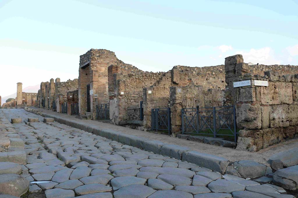 Via Stabiana, Pompeii. December 2018. 
Looking north along east side of Via Stabiana, from Vicolo del Menander, on right. Photo courtesy of Aude Durand.