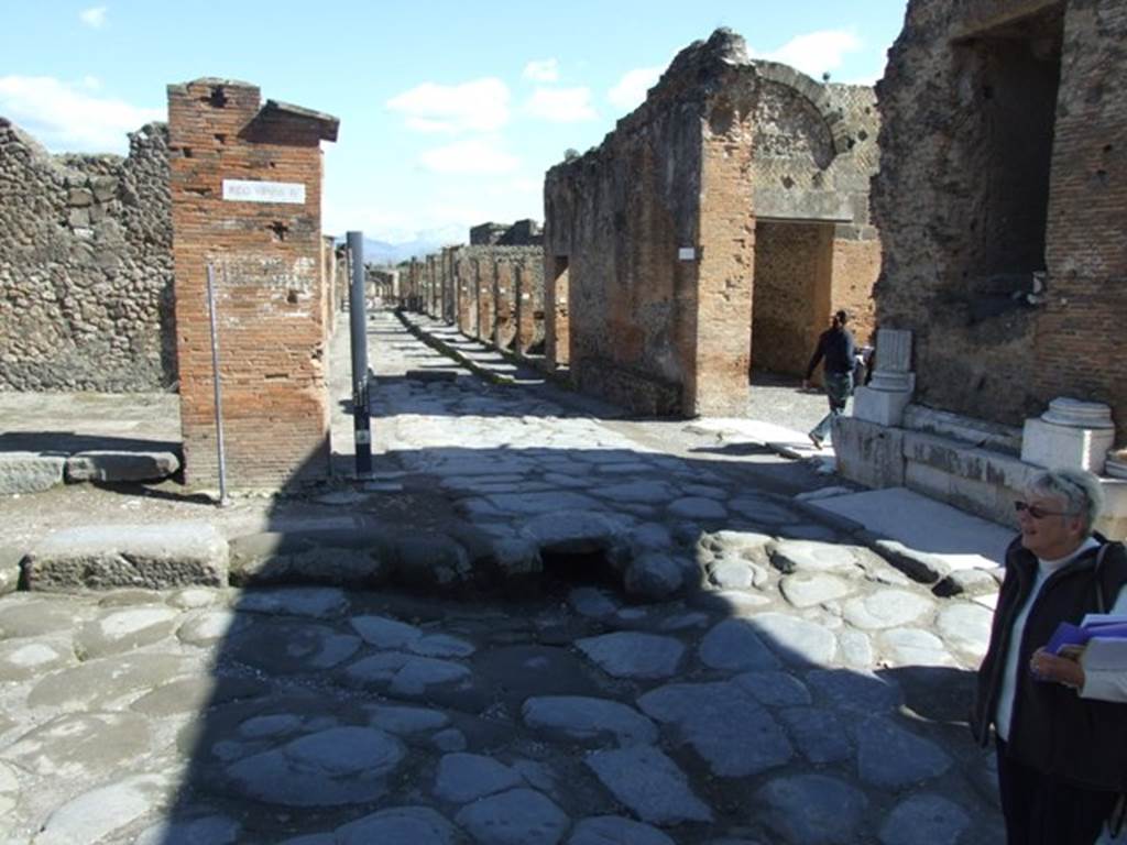 Via del Foro. March 2009. Looking east along Via degli Augustali between VII.4 and VII.9.