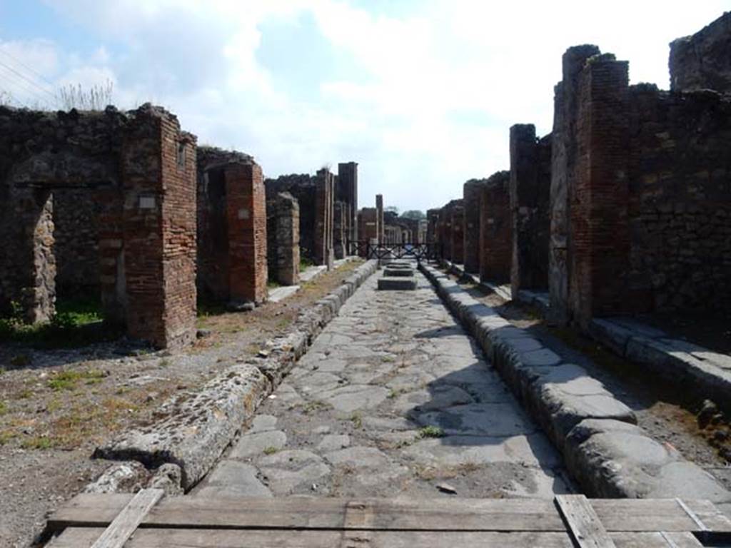 Via degli Augustali, May 2015. Looking east from between VII.4, on left, and VII.9, on right.  Photo courtesy of Buzz Ferebee.