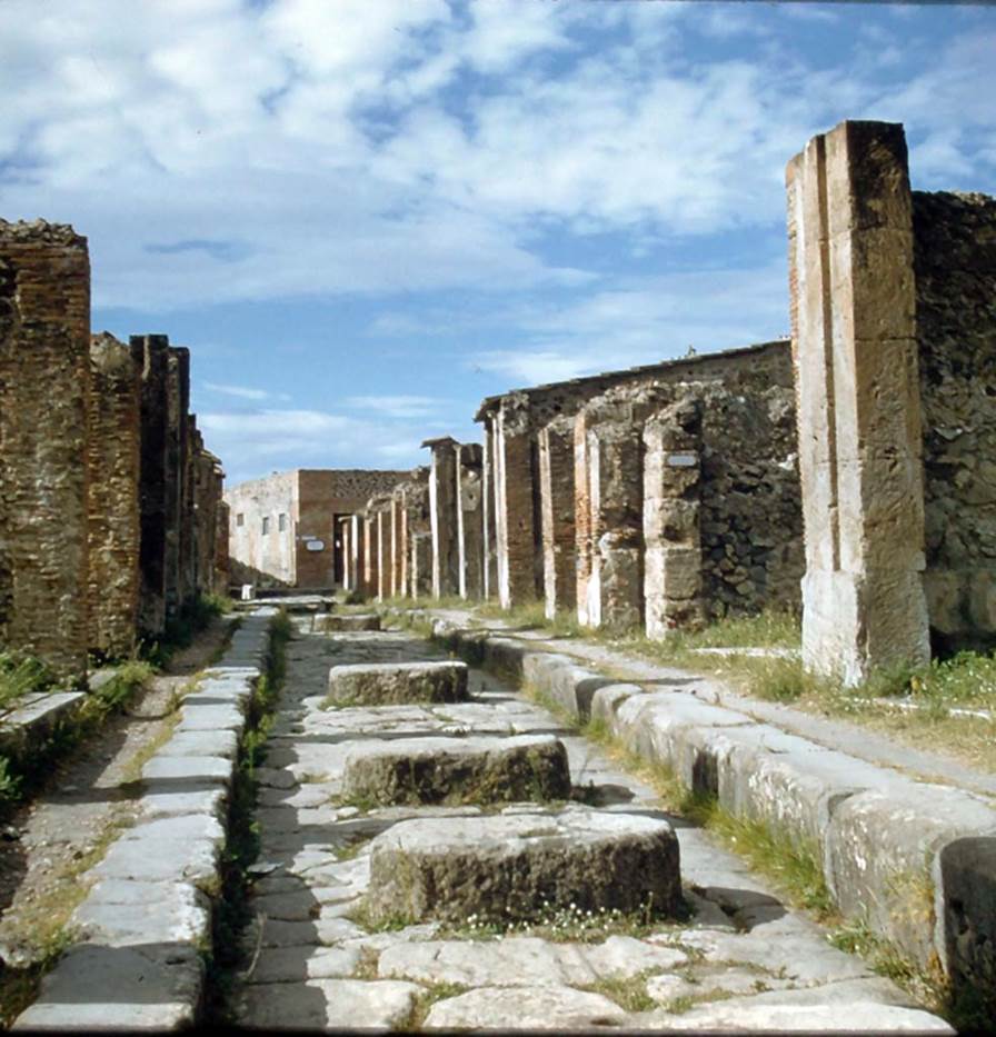 Via degli Augustali, Pompeii. November 1958. Looking west between VII.9 and VII.4, towards restaurant (centre left). 
Photo courtesy of Rick Bauer.