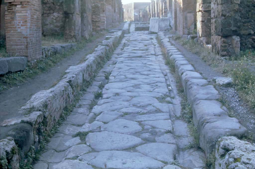 Via degli Augustali, between VII.12 and VII.2. 4th December 1971. Looking west at road surface. 
Photo courtesy of Rick Bauer, from Dr George Fay’s slides collection.