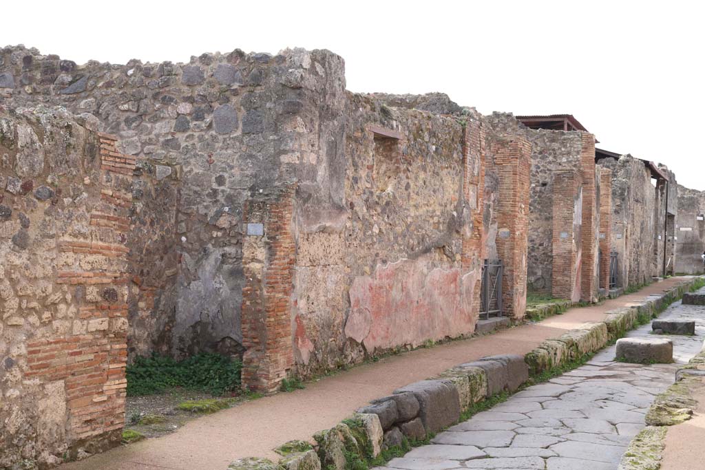Via degli Augustali, Pompeii. December 2018 
Looking west along north side of Insula VII.1, on Via degli Augustali, with VII.1.35, on left. Photo courtesy of Aude Durand.