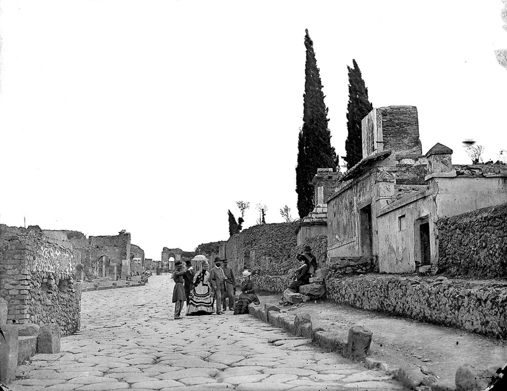 Via dei Sepolcri, Pompeii. 1871. Looking south with tombs at HGW17 and HG18, on right.
Photo by J. H. Parker, © American Academy in Rome. Parker.2160.Italia.