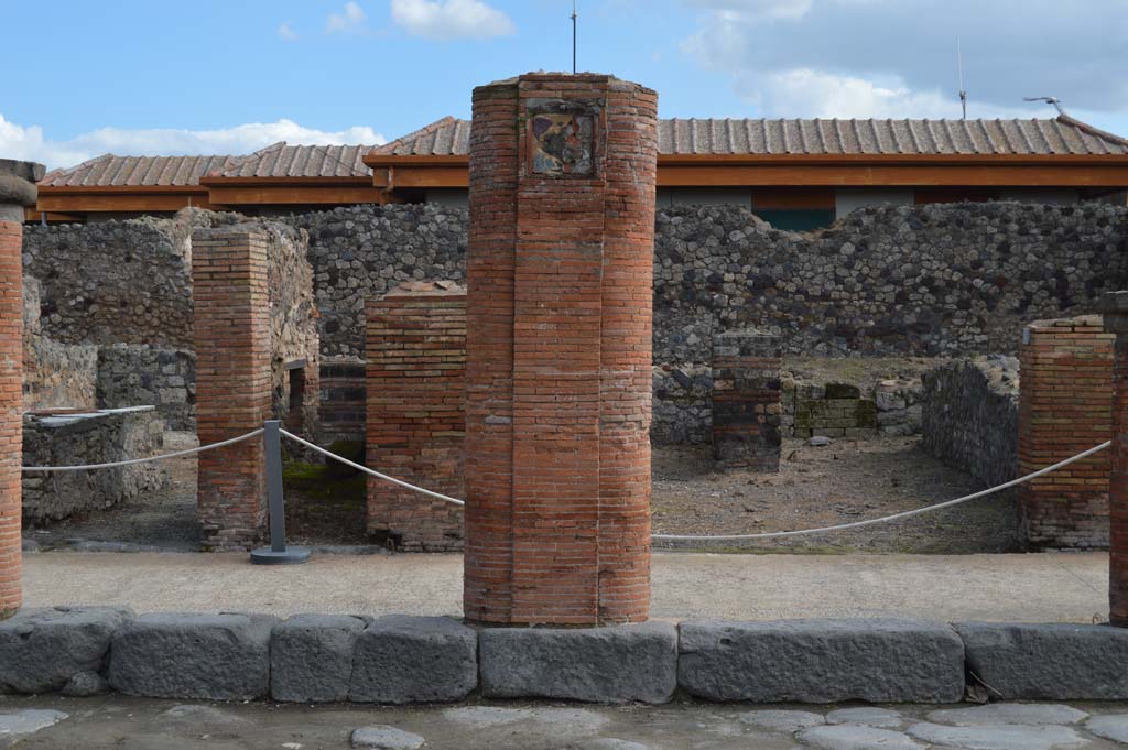 Via del Foro, east side, Pompeii. March 2018. 
Looking east to seventh pilaster/column from south end, outside VII.4.6, at rear, behind portico.
Foto Taylor Lauritsen, ERC Grant 681269 DÉCOR.