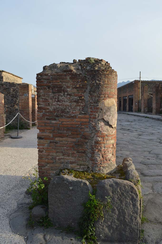 Via del Foro, east side, Pompeii. March 2019. Looking south at north end pilaster/column base. 
Foto Taylor Lauritsen, ERC Grant 681269 DÉCOR.