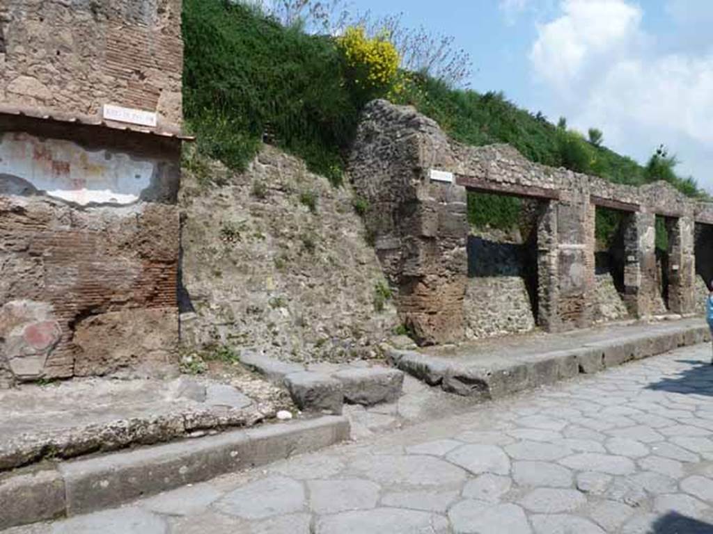 Via dell’Abbondanza, north side. May 2010. Looking east towards unnamed vicolo between IX.13 and III.1.