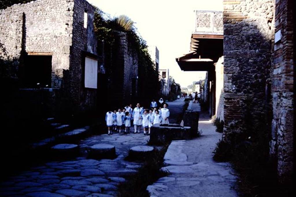 Via dell’Abbondanza, Pompeii. 1966. Looking east between III.2 and 1.12, from near junction with Vicolo della Nave Europa. Photo by Stanley A. Jashemski.
Source: The Wilhelmina and Stanley A. Jashemski archive in the University of Maryland Library, Special Collections (See collection page) and made available under the Creative Commons Attribution-Non Commercial License v.4. See Licence and use details.
J66f0594