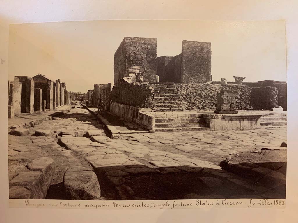 Via della Fortuna, Pompeii.
From an album of Michele Amodio dated 1874, entitled “Pompei, destroyed on 23 November 79, discovered in 1745”. 
Looking east along VI.10, towards VI.12, on left. Temple of Fortuna Augusta and Via del Foro, on right. Photo courtesy of Rick Bauer.