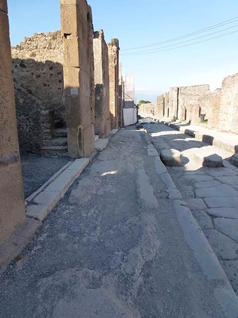 Via della Fortuna, June 2012. Looking east along pavement on north side, from near VI.12.4. Photo courtesy of Michael Binns.
