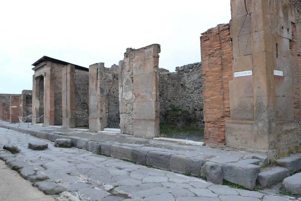 Via della Fortuna, north side. December 2018. 
Looking north-west from VI.12.6, centre right, towards VI.12.1, on left. Photo courtesy of Aude Durand.