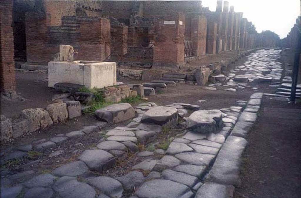 Via della Fortuna, north side, July 2011.  
Looking north-east to junction with Via del Vesuvio, left, and Via Nola, ahead. 
Photo courtesy of Rick Bauer.