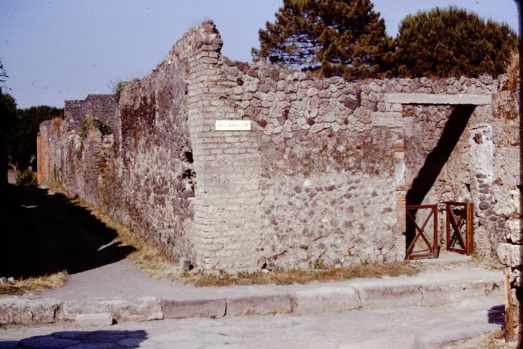 Via della Palestra, Pompeii. 1973. 
Looking east from the junction with Via di Nocera towards exterior north wall of II.8.6. Photo by Stanley A. Jashemski. 
Source: The Wilhelmina and Stanley A. Jashemski archive in the University of Maryland Library, Special Collections (See collection page) and made available under the Creative Commons Attribution-Non-Commercial License v.4. See Licence and use details.
J73f0225