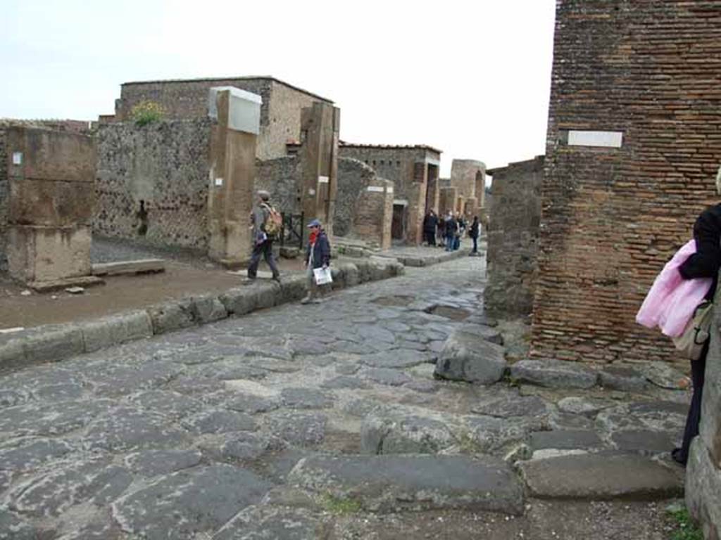 Via delle Terme, north side. May 2010.  Looking north-east from the end of Vicolo delle Terme, towards the junction of Vicolo della Fullonica, between VI.6 and VI.8.